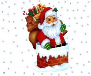 пазл Санта Клаус в предстоящей через трубу Ладена со многими подарками